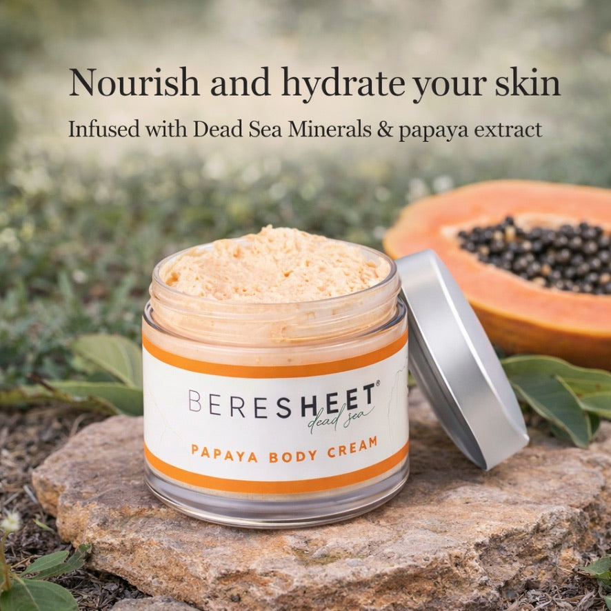 Beresheet Papaya Body Cream jar with papaya and Dead Sea minerals on a natural background