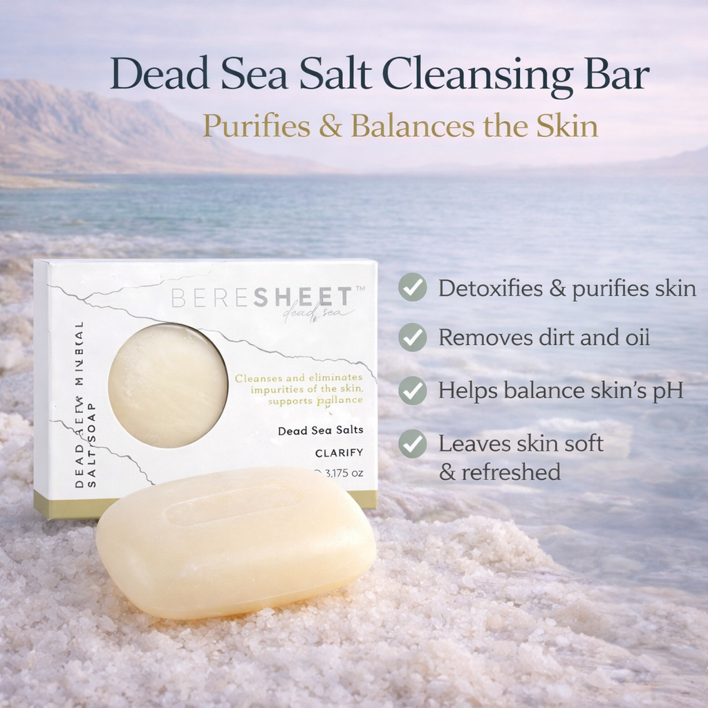 Dead Sea Salt Cleansing Bar with packaging on a beach background