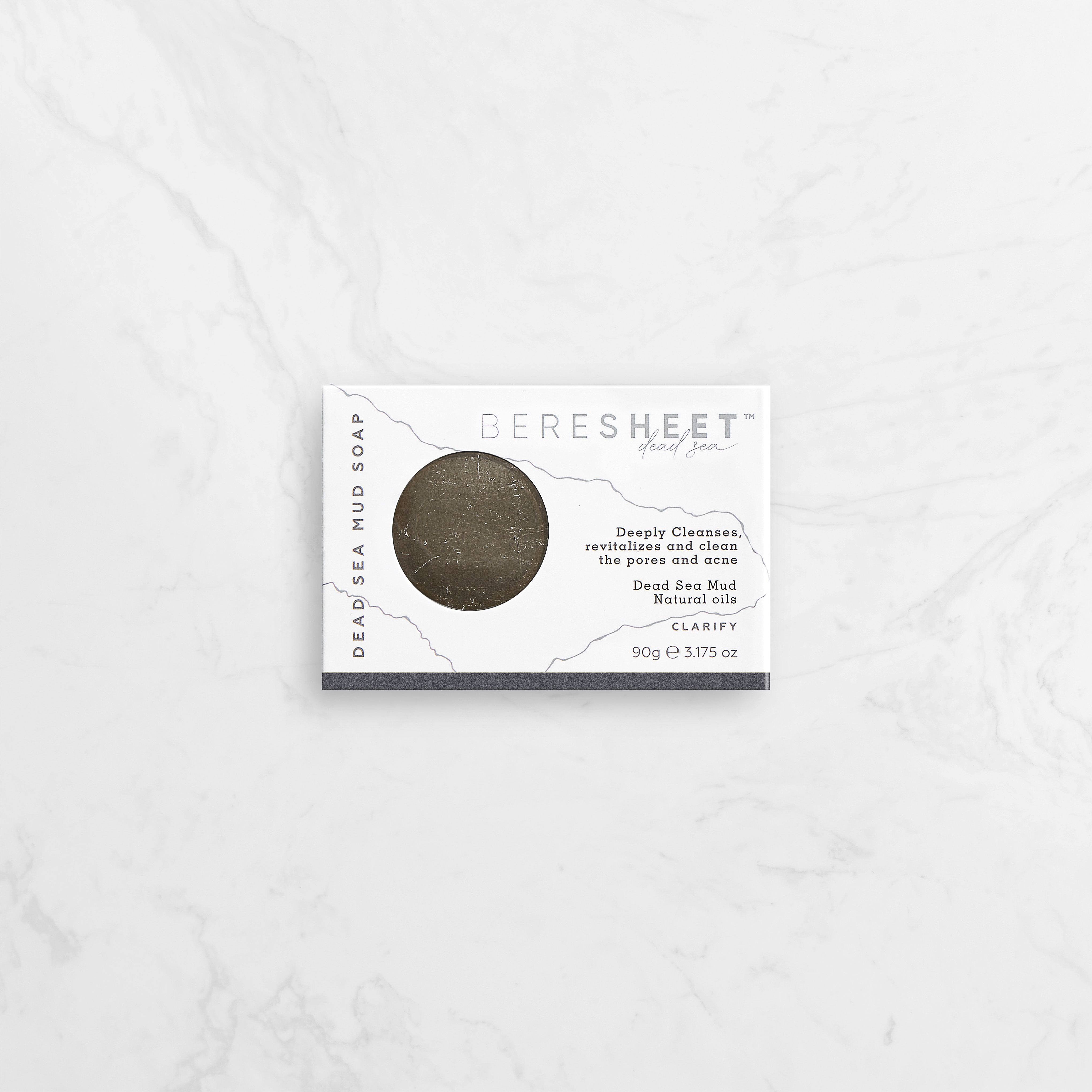 Bar of soap with packaging labeled 'Beresheet' on a white background