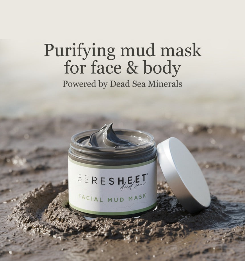 Beresheet facial mud mask jar with mud on a sandy background