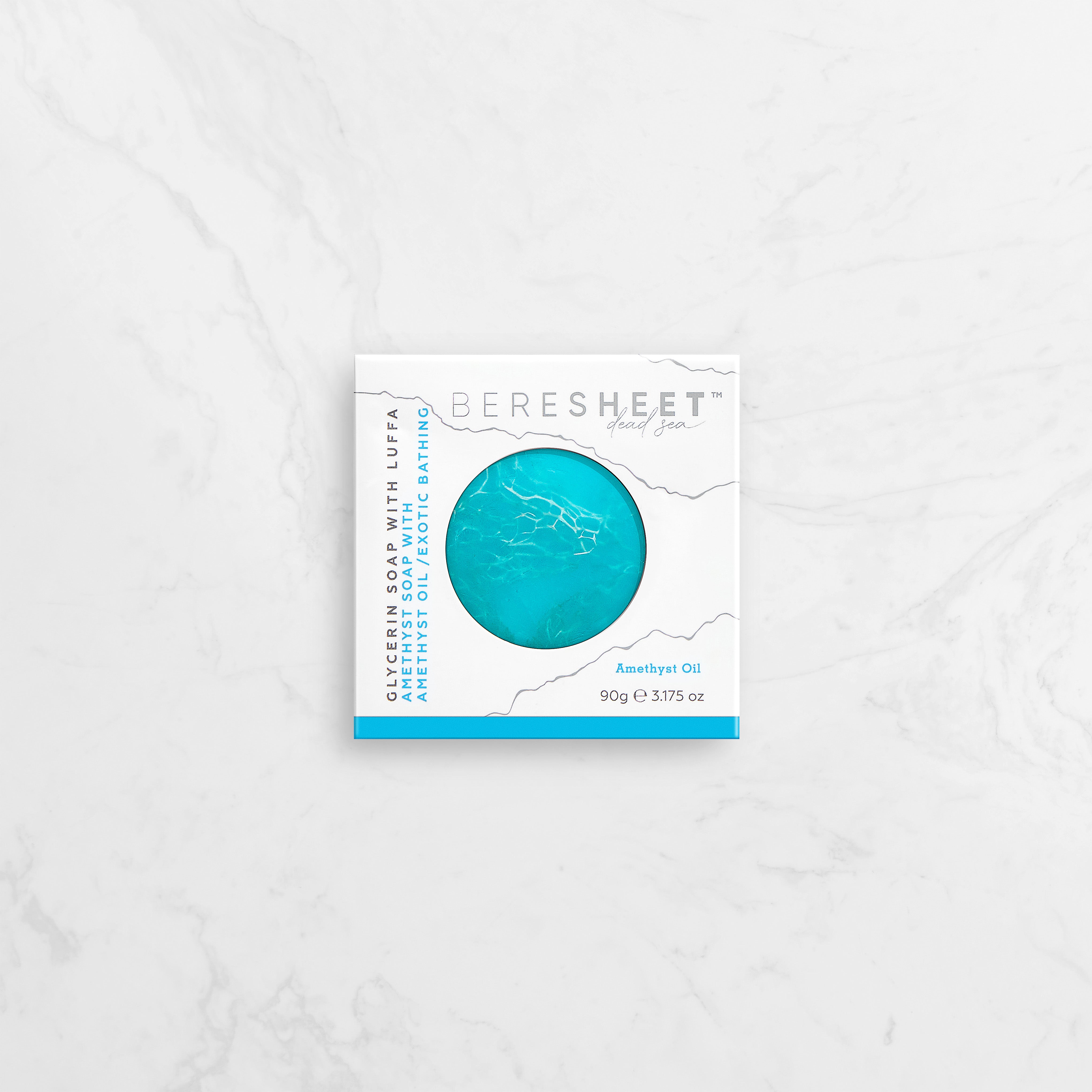 Blue soap bar with a white box on a light gray background