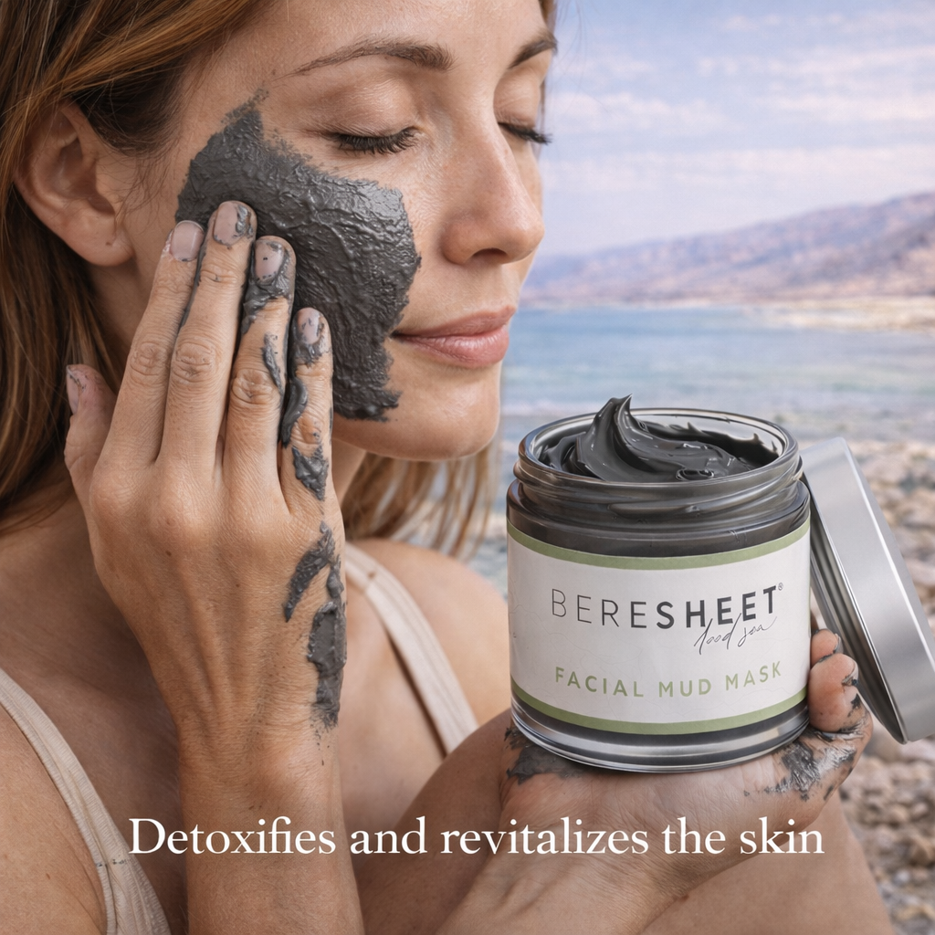 Woman applying facial mud mask with Beresheet Facial Mud Mask jar against a scenic background